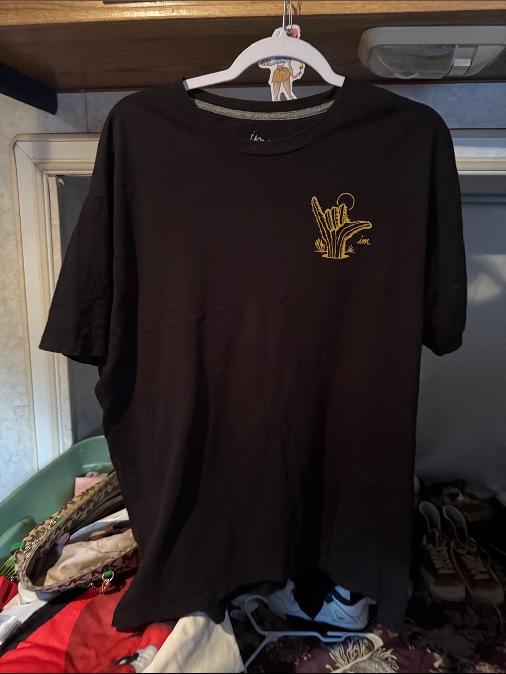 Black Short-Sleeve Graphic Tee with Yellow Surf Hand Logo